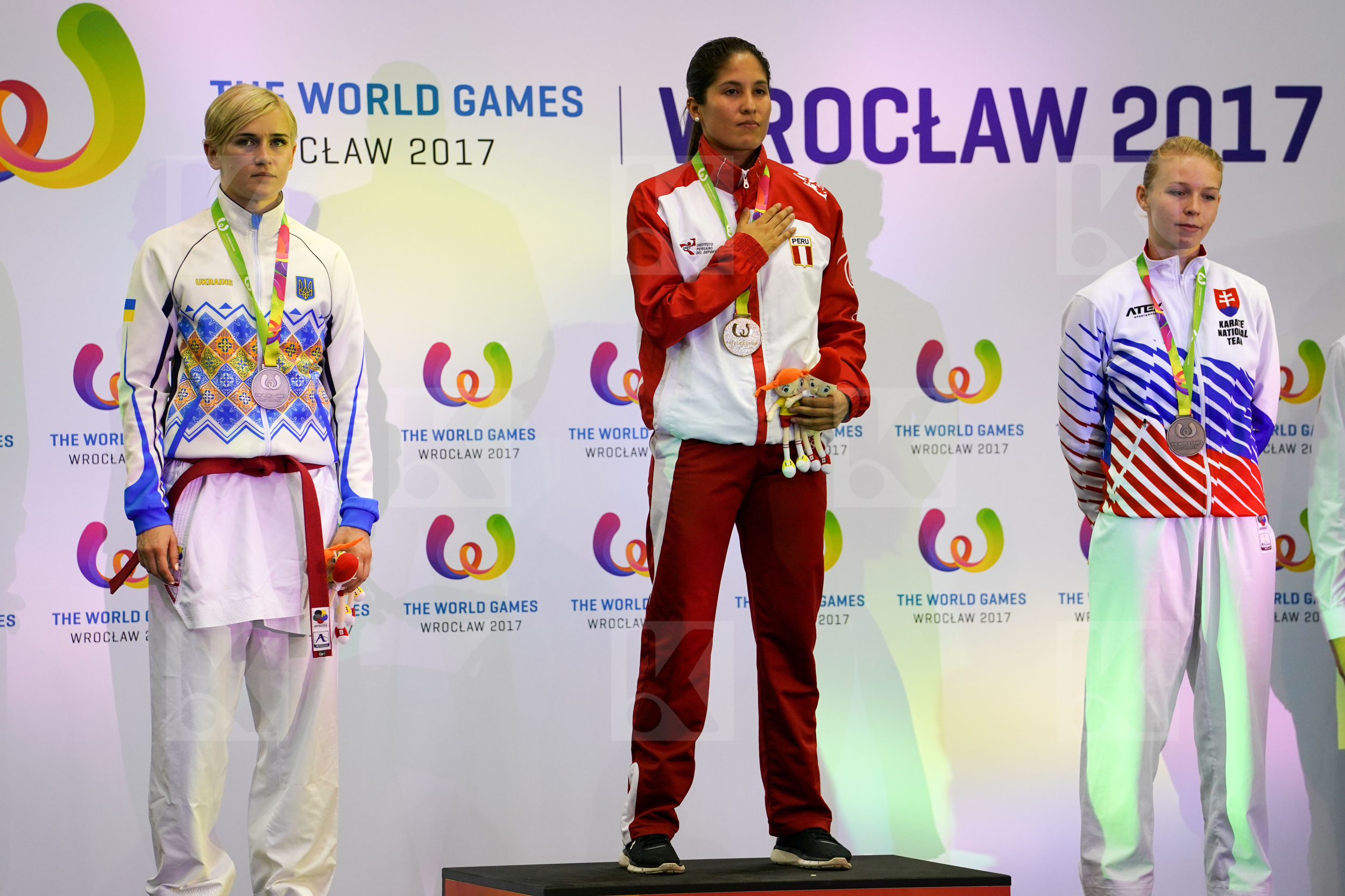 Female Kumite -61kg Grande Alexandra Peru podium Serogina Anita Slovakia Suchankova Ingrida Ukraine